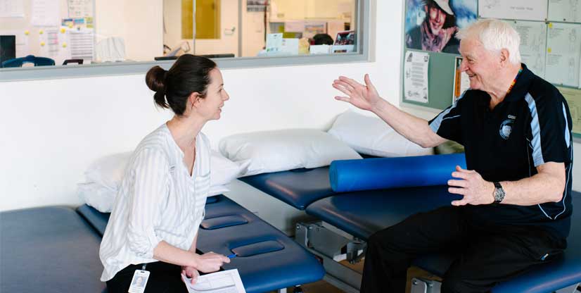 A physiotherapist and patient in the Kokoda Gym at Heidelberg Repatriation Hospital