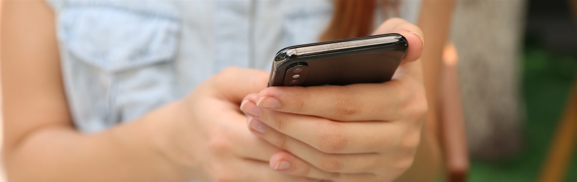 Woman holding mobile phone